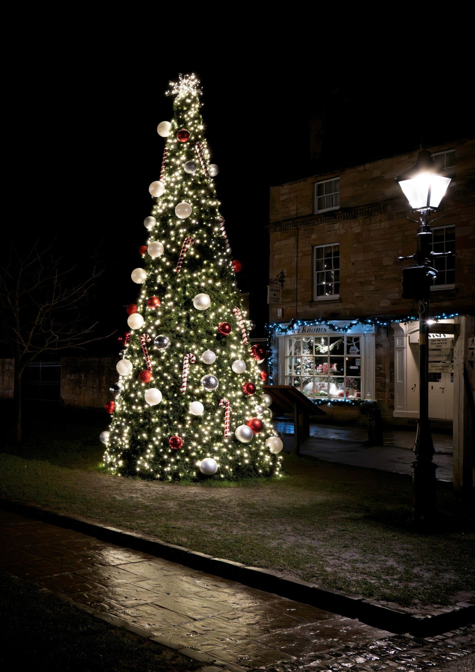 Christmas tree light decorations at night in Broadway, Cotswolds